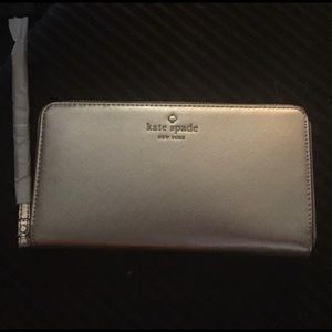 Brand new Kate Spade gold wristlet